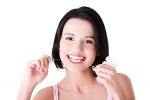 woman flossing